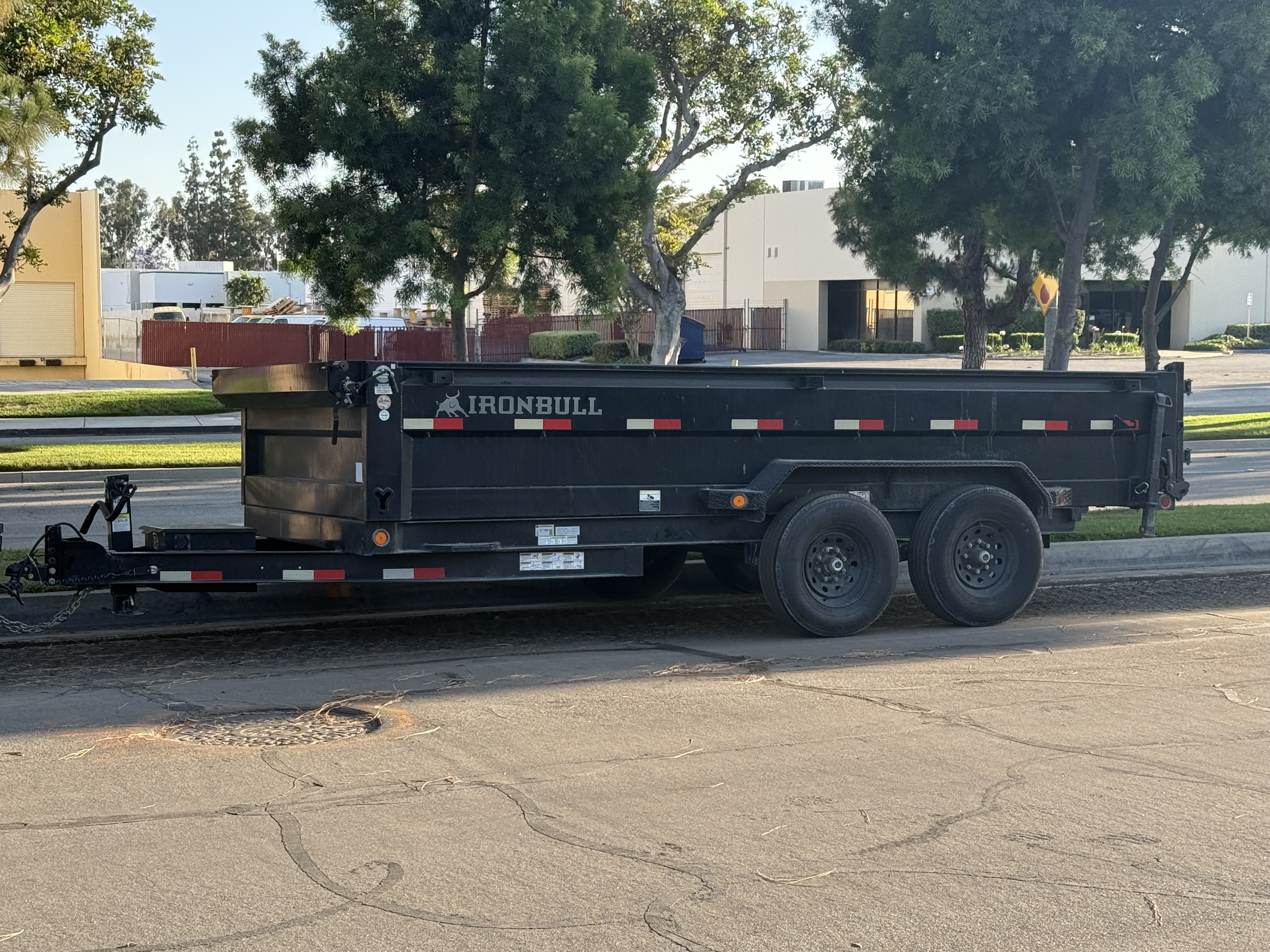 Iron Bull 14,000 lb dump trailer for rent - ideal for construction debris, landscaping materials, and heavy hauling in Norwalk, CA